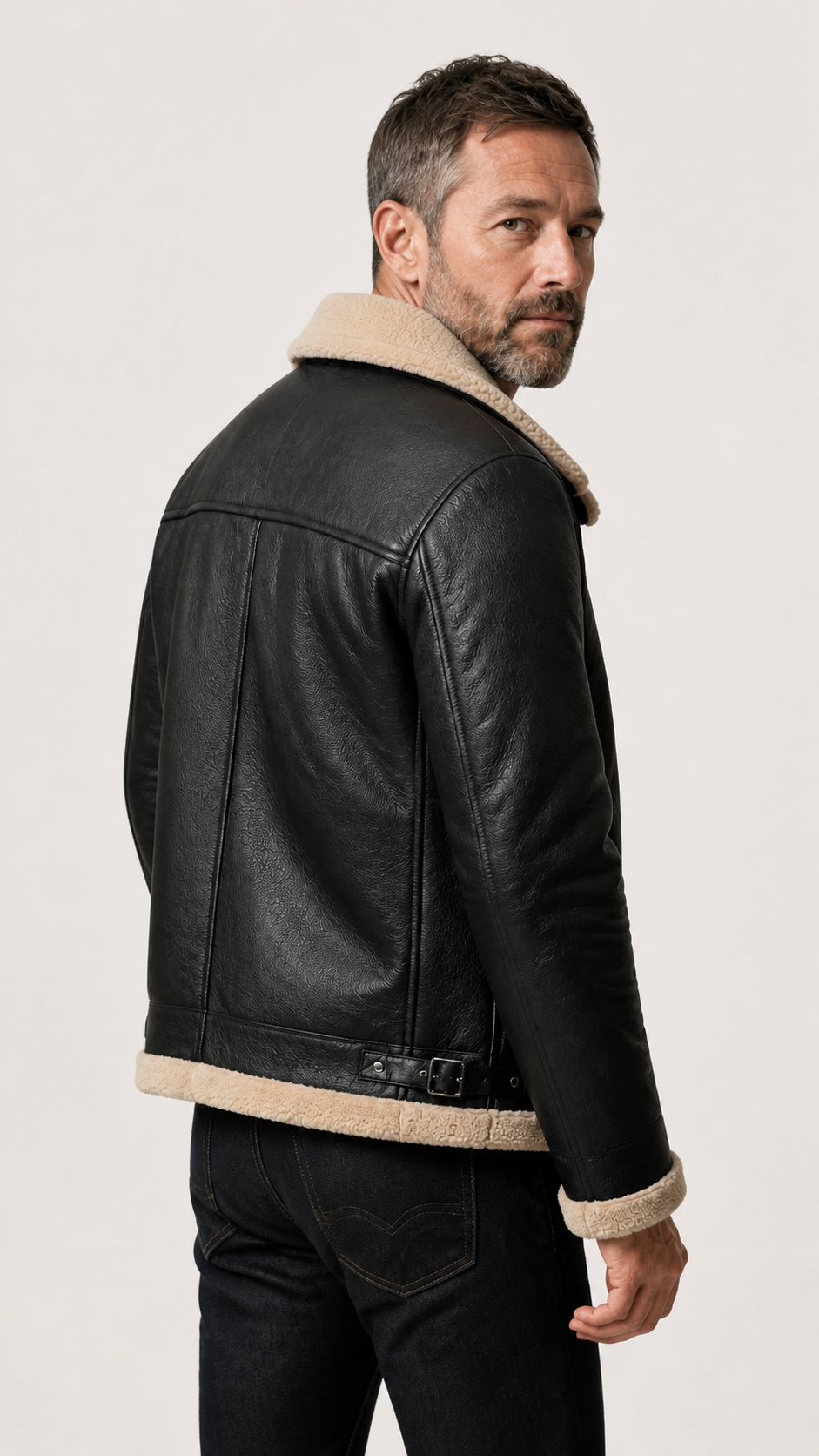 Back view of a man in the black B-3 shearling jacket — British model