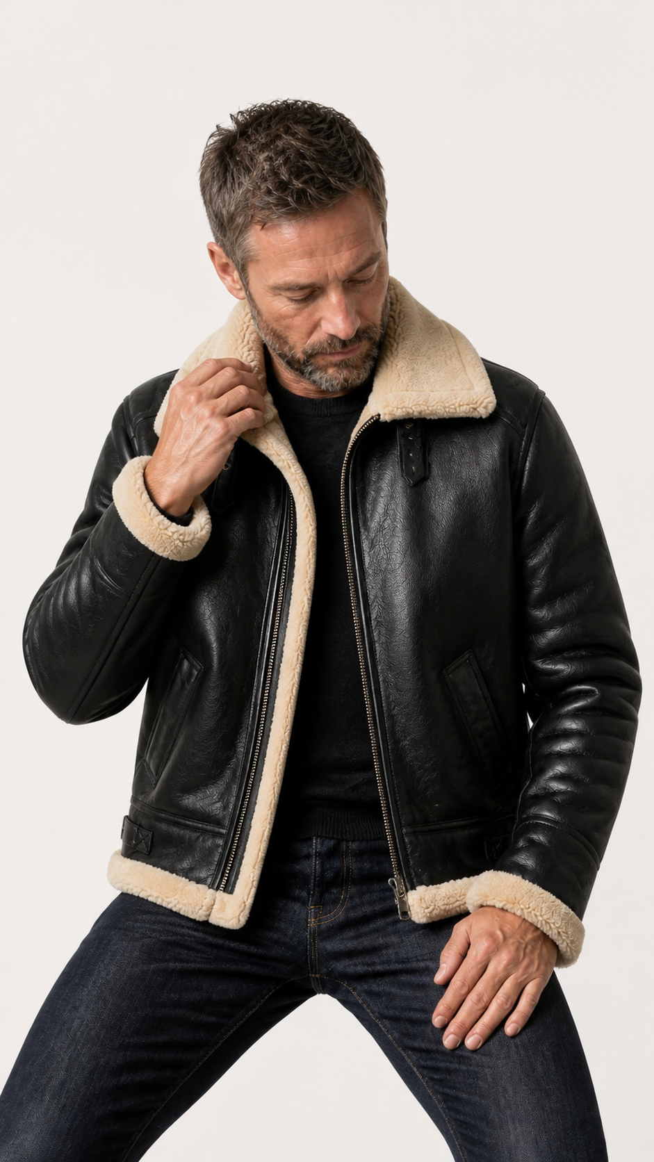 Man seated wearing the black B-3 shearling flight jacket — British model